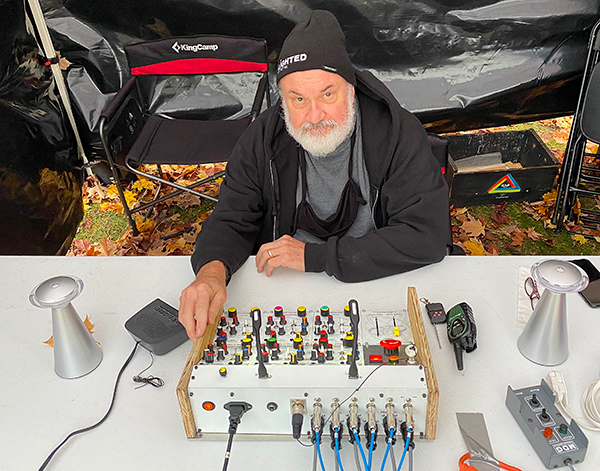Laser Artist Mike Gould at the console controlling Drums N' Lasers