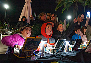 Visitors lunchboxing with lasers